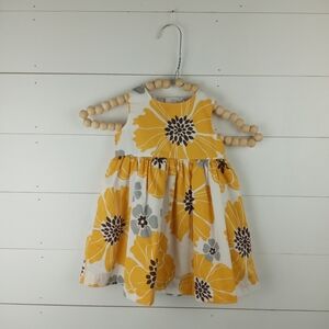 Carter’s girls size 9 mos white and yellow large floral design dress
